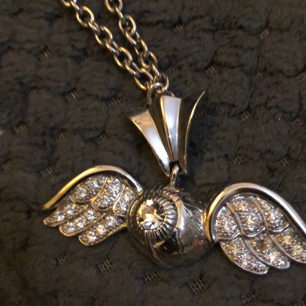 Beautiful flying eyeball necklace. Sturdy chain  very nice piece